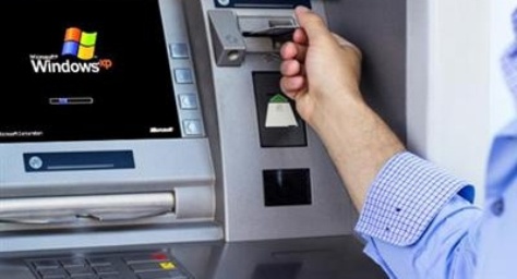 Fim do Windows XP faz bancos correrem para atualizar caixas